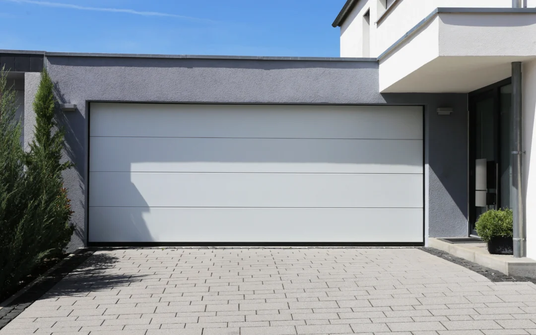 Comment installer une porte de garage sectionnelle ?